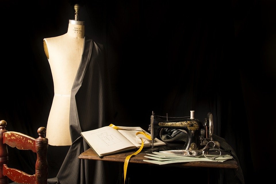 A sewing machine and a dress-up doll. Career advice and application